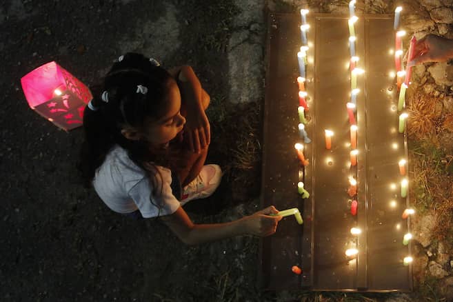 Ideas y trucos para lograr las mejores fotos familiares en el Día de Velitas