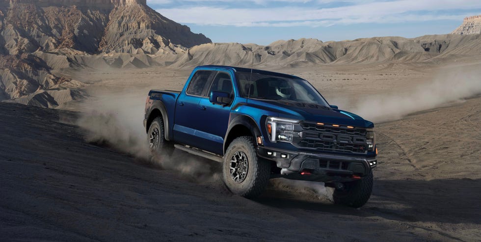 ford f150 raptor r truck navigating a desert landscape