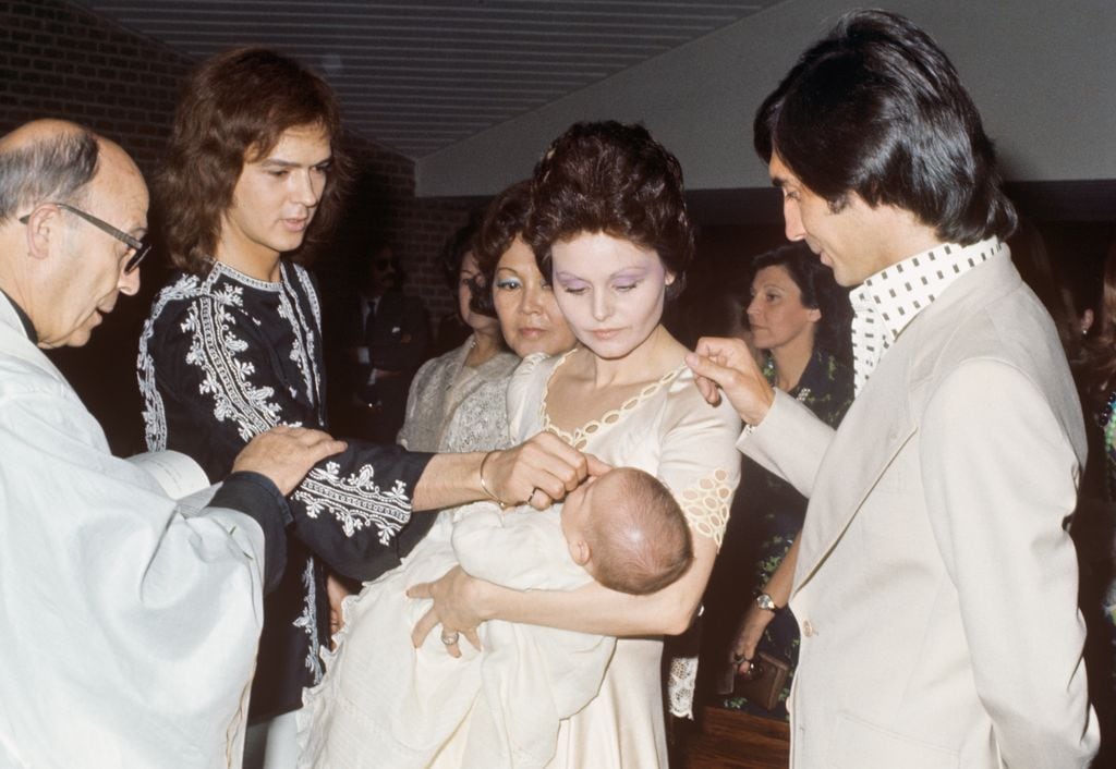 Rocío y Junior durante el bautizo de su hijo
