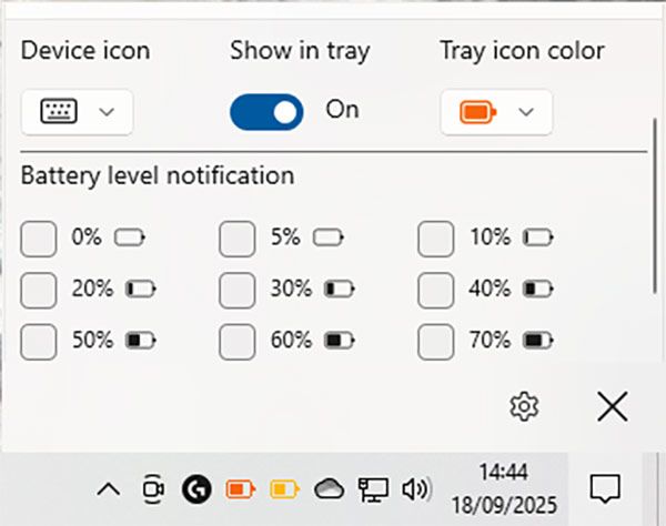 Menú para configurar notificaciones en Bluetooth Level Battery, estableciendo una alerta cuando la batería descienda de un determinado %