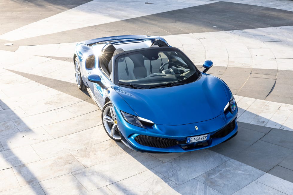 convertible sportscar on a modern pavement convertible sportscar on a modern pavement