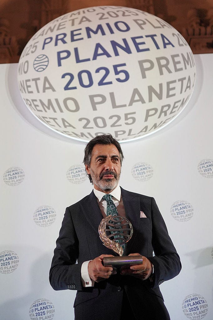 winner of spains 2025 premio planeta award, spanish writer juan del val poses with the trophy for his novel no es tan facil de morir de amor (its not so easy to die of love) writen under the pseudonym elvira torres, after the ceremony of the 74th edition of the premio planeta award at the national art museum of catalonia in barcelona on october 15, 2025. (photo by manaure quintero / afp) (photo by manaure quintero/afp via getty images)