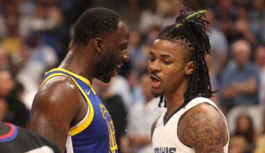 Draymond Green y Ja Morant durante un roce en cancha.