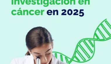 Investigadora observando a través de un microscopio en un laboratorio de cáncer