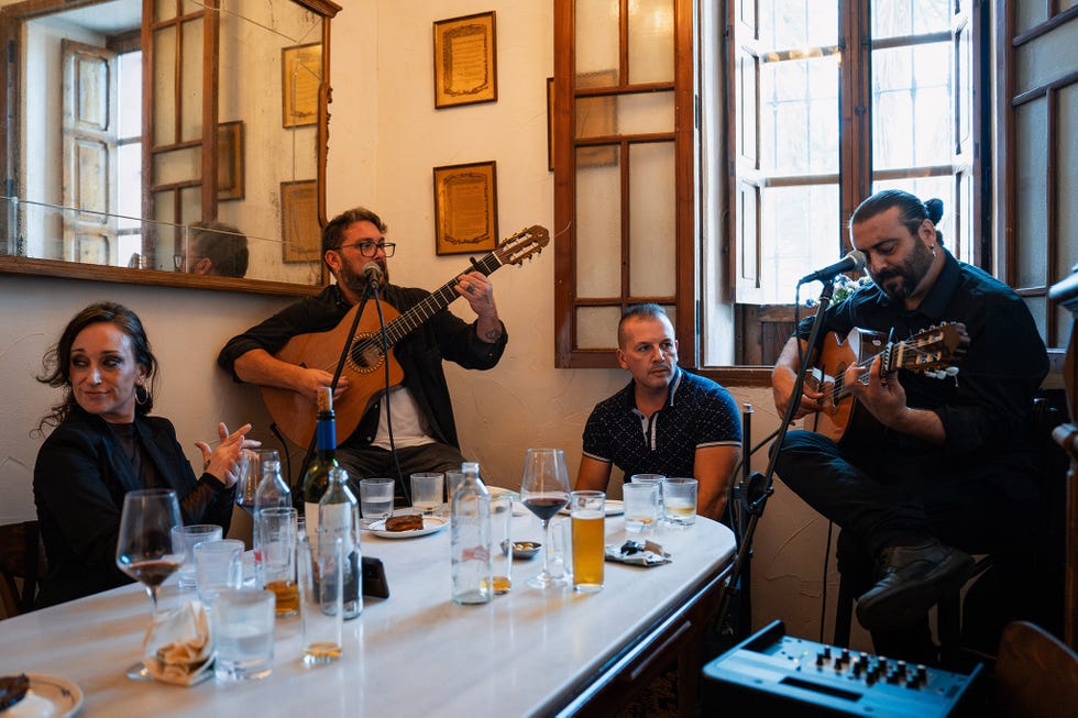 musicians performing in a cozy restaurant setting