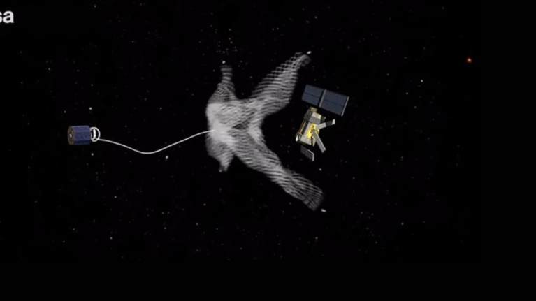 Piirroskuva satelliittia kohti laukaistusta avautuvasta verkosta. 