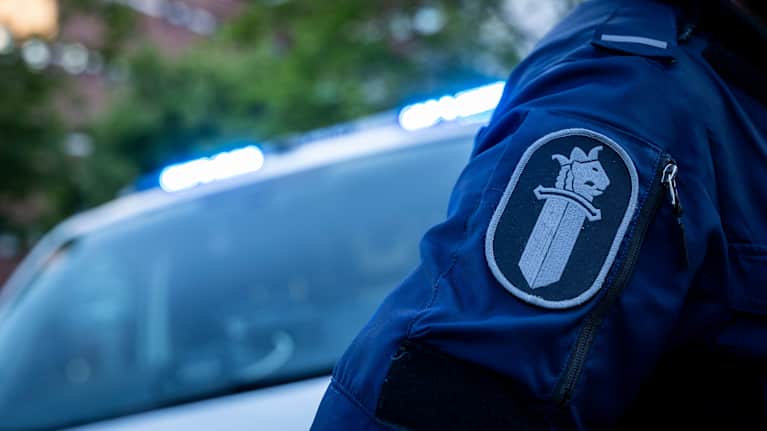 Poliisin hihamerkki.