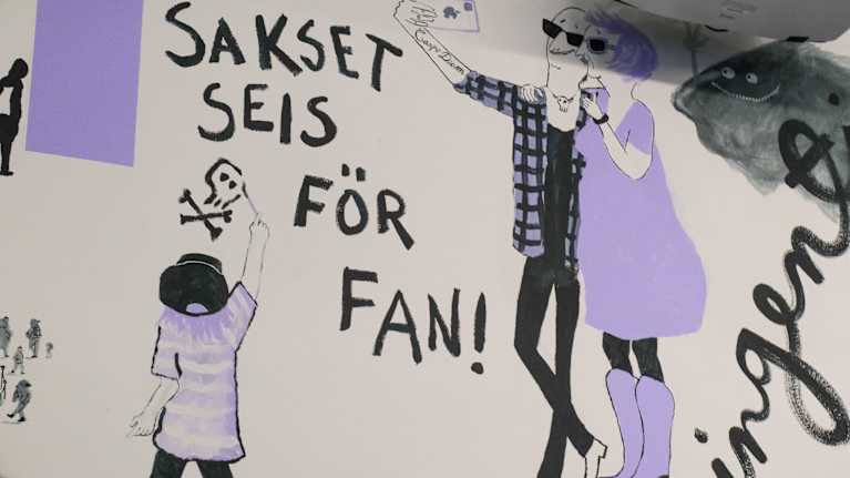 Del av en mural med några figurer och texten "Sakset seis för fan!".