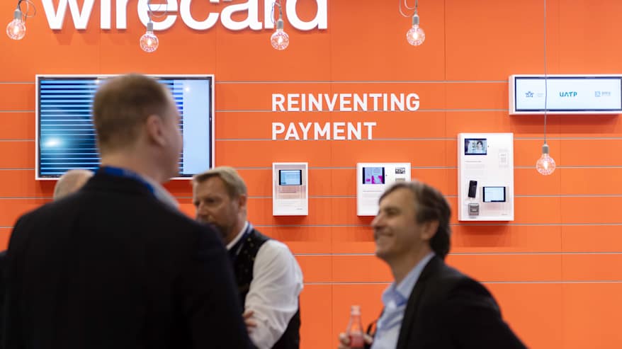 Näytteilleasettajat ja vieraat rahoituspalveluyritys Wirecardin osastolla kansainvälisillä matkailumessuilla (ITB) Berliinissä, Saksassa, 6. maaliskuuta 2019.