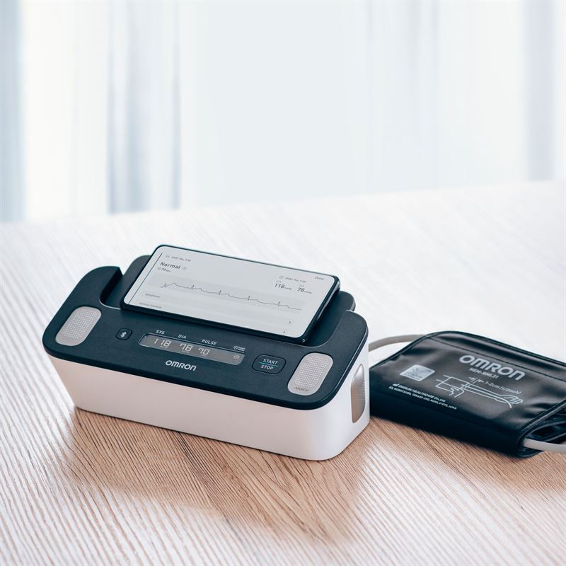 Product_Detail_Page-Complete_HEM-7530T_Device on desk.jpg