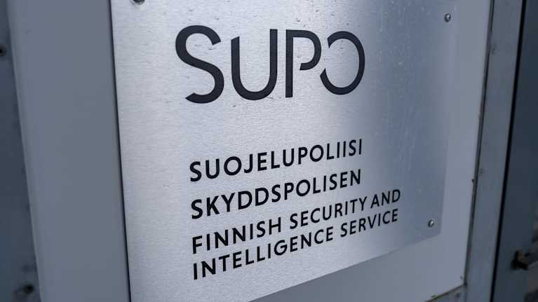 Supon kyltti ovessa.