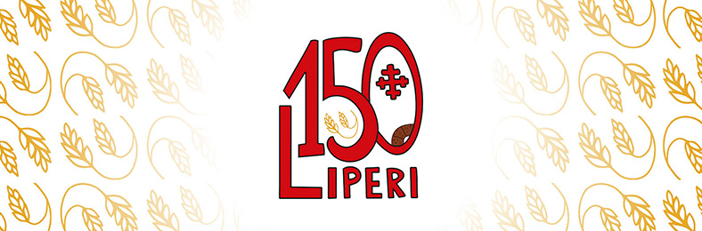 Liperin kunnan juhlavuoden logo ja taustalla tähkäkuosi