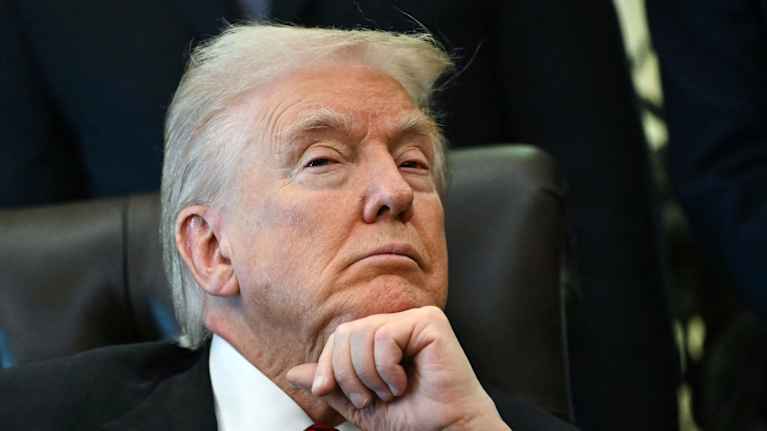 Henkilökuvassa Donald Trump.