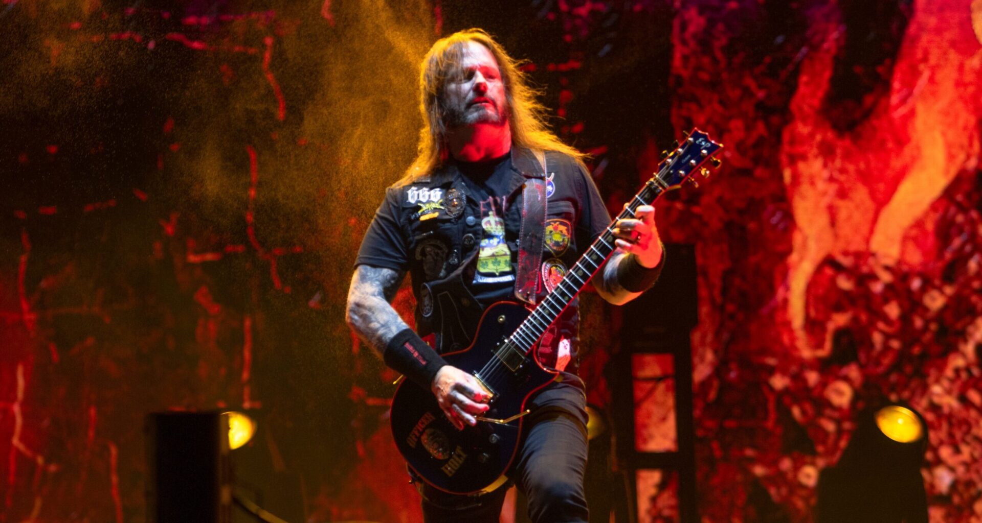 "Olemme kiertävä pop-up -kauppa" - Gary Holt puhuu kiertue-elämän taloudellisista realiteeteista