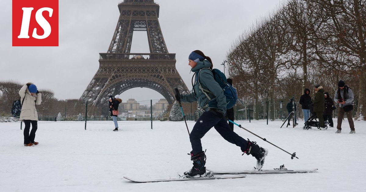Lumikaaos yllätti Euroopan – hiihtoa Pariisin keskustassa