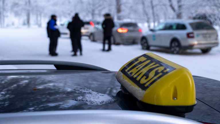 Taksi ja taksikuskeja Rovaniemellä.