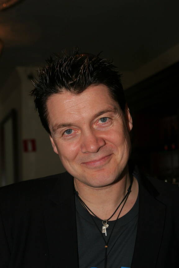 Geir Rönning hymyilee.