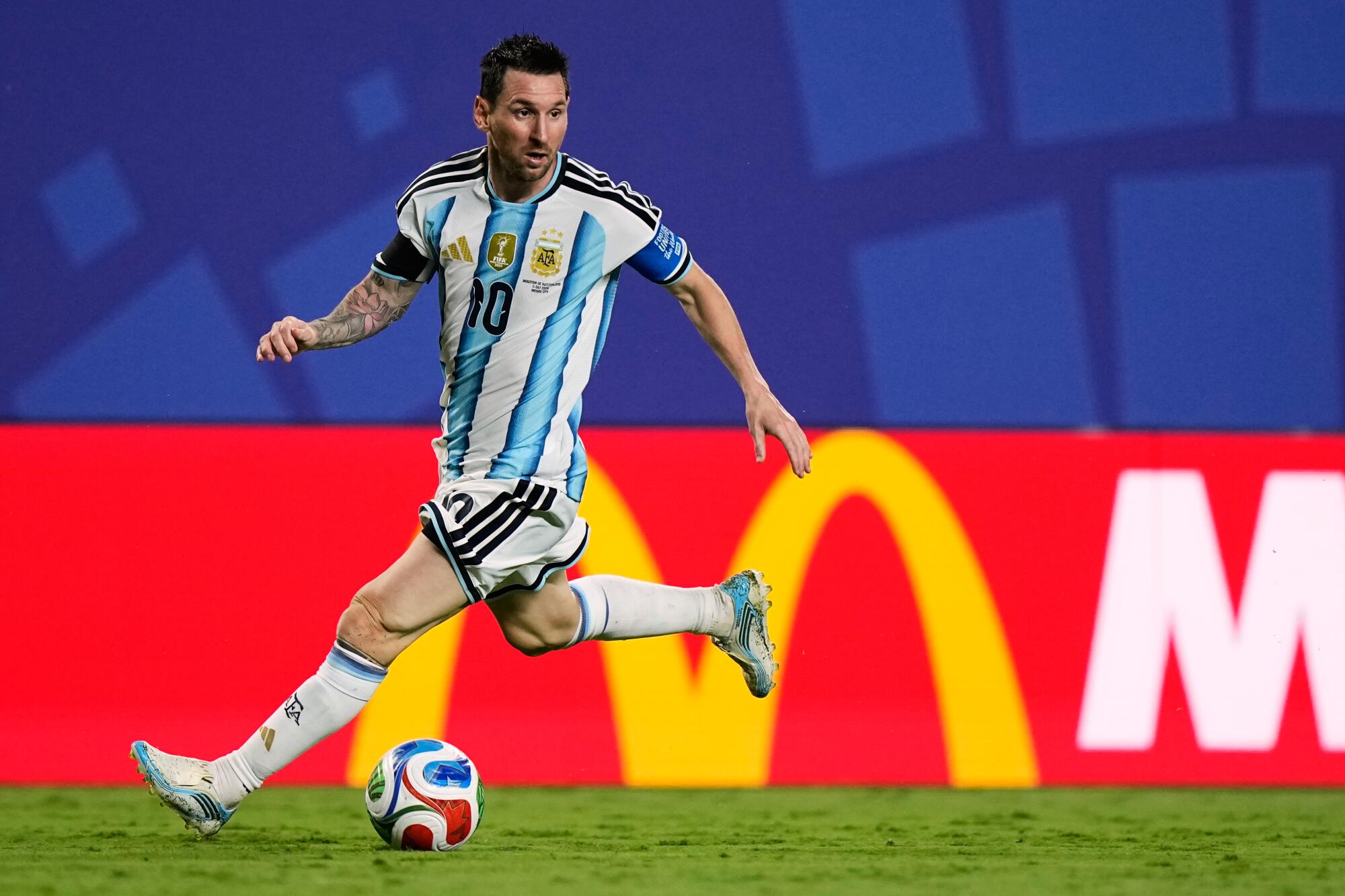 Argentina's Lionel Messi controls the ball during a win over Switzerland.