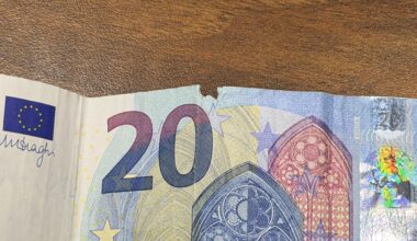 The central W-shaped damage of the euro