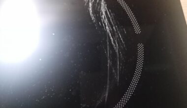 Hi, I need an advice. Microfiber cloth was placed on a hot surface on a glass-ceramic hob, now there is a stain that looks like it was burned. How to clean it?