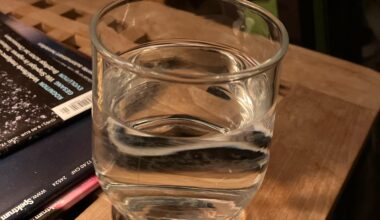 Cleaning empty mustard packaging and using them as glasses