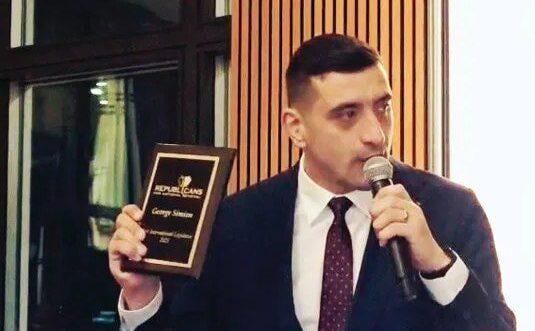 Jurnalist, dezvăluiri: ONG-ul care l-a premiat pe Simion la Washington vrea ieşirea SUA din NATO, pentru că "provoacă Rusia"