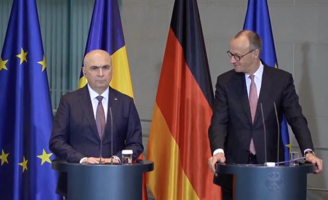 ULTIMA ORĂ Bolojan vrea pact în România pentru moneda euro. Bolojan propune, de lângă cancelarul Germaniei, un pact al forțelor politice în vederea adoptării monedei euro