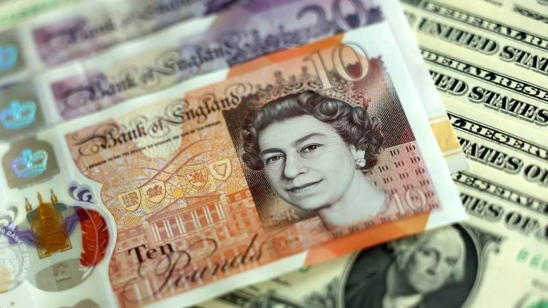Pound hits 4-year high as dollar weakens