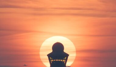 Setting sun behind the Schiphol air traffic tower