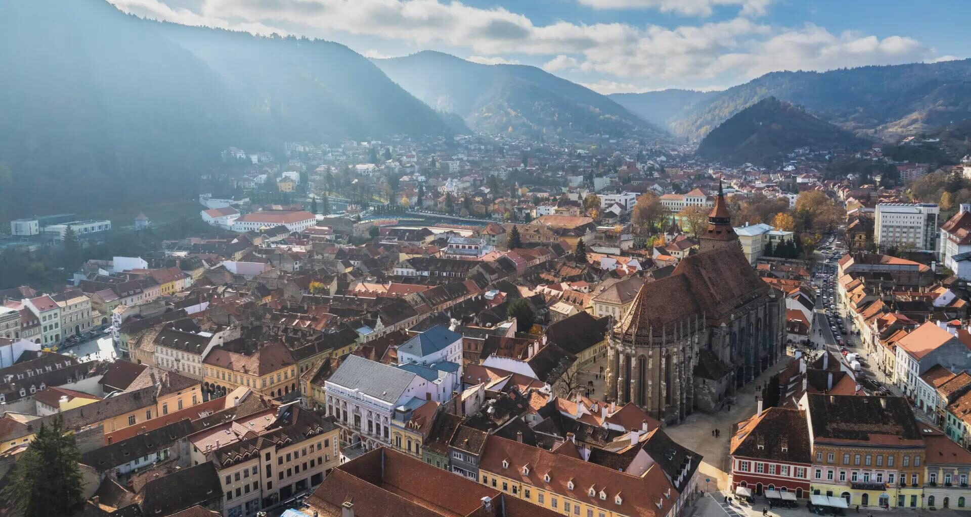 Brașov, also known as Kronstadt, a city nestled between the Carpathian mountains in Romania.