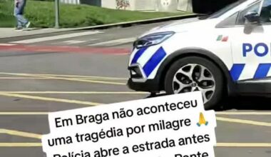 Police opening up traffic while race is passing by in Volta a Portugal