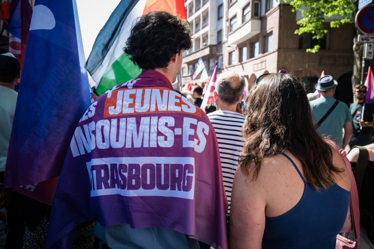 Premier mai défilé intersyndical droit des travailleurs manifestation politique