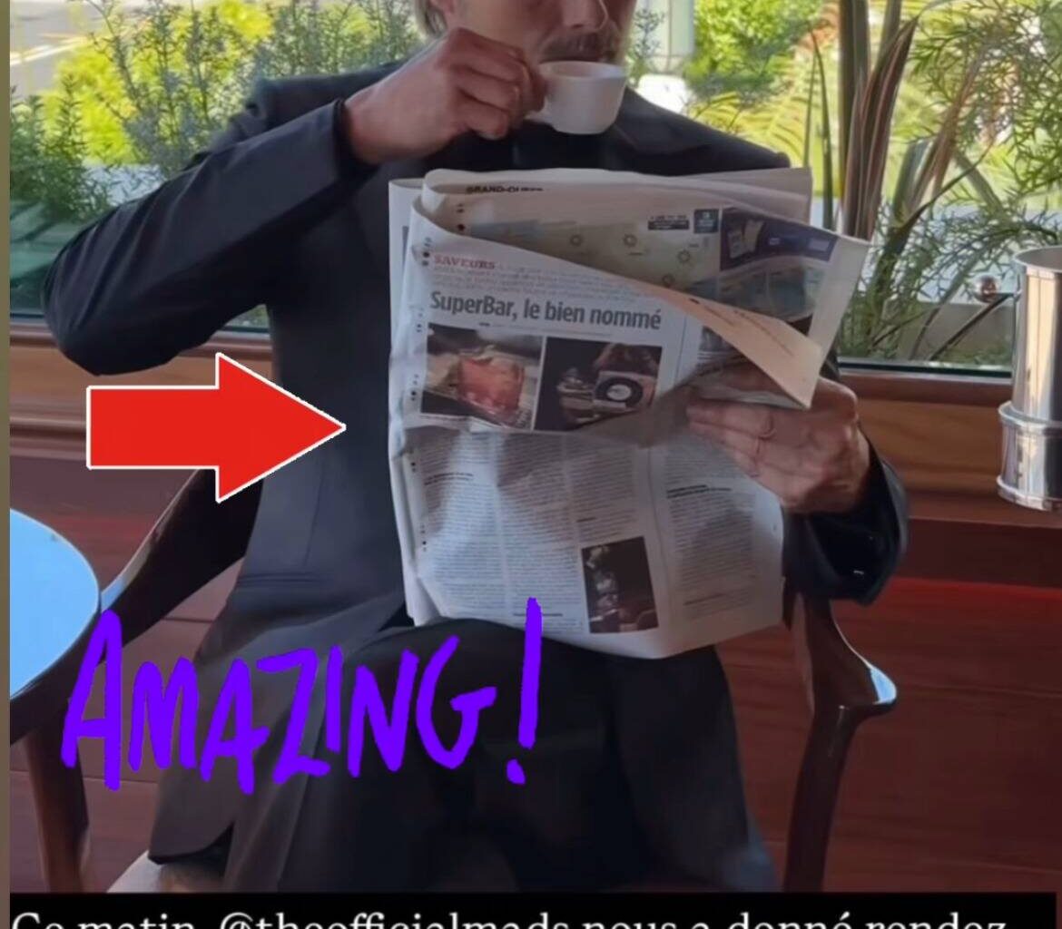 78e Festival de Cannes: cette photo d'un grand acteur feuilletant Nice-Matin à la terrasse du Martinez a fait fondre nos petits coeurs