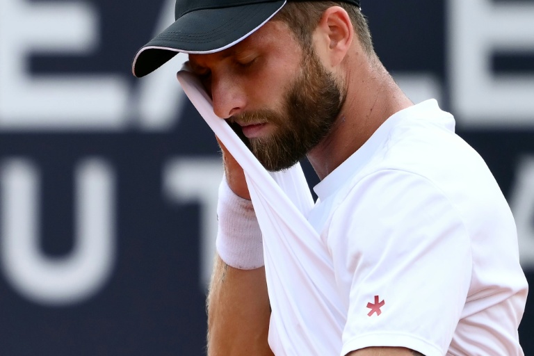 Le Français Corentin Moutet lors de son 8e de finale du Masters 1000 de Rome face au Britannique Jack Draper le 13 mai 2025 (Marco BERTORELLO)