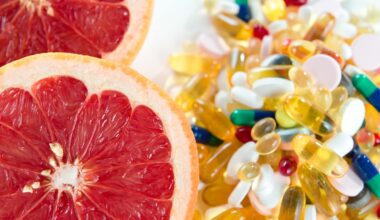 Pink Grapefruit And Pills, Vitamin Supplements On White Background