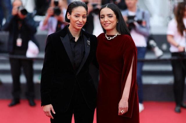 photo la comédienne nadia melliti et la réalisatrice hafsia herzi, en mai, sur le tapis rouge du dernier festival de cannes pour « la petite dernière ».  ©  getty images via afp