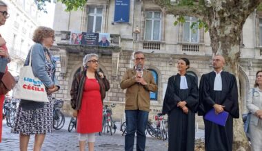 une banderole de soutien à Cécile Kholer et Jacques Paris, otages en Iran depuis 2022, accrochée sur le centre Jean Moulin