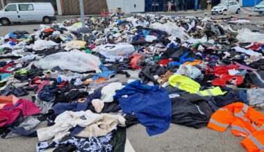 Grand Nancy. 15 tonnes de vêtements déversés devant Décathlon et Kiabi, cibles d’une action surprise à Houdemont