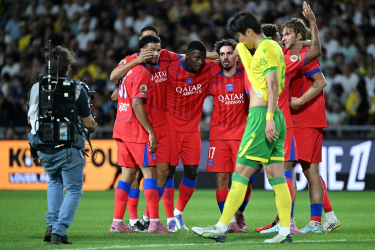 Le capitaine du PSG Vitinha (c), auteur du but de la victoire à Nantes, le 17 août 2025  ( AFP / Sebastien Salom-Gomis )