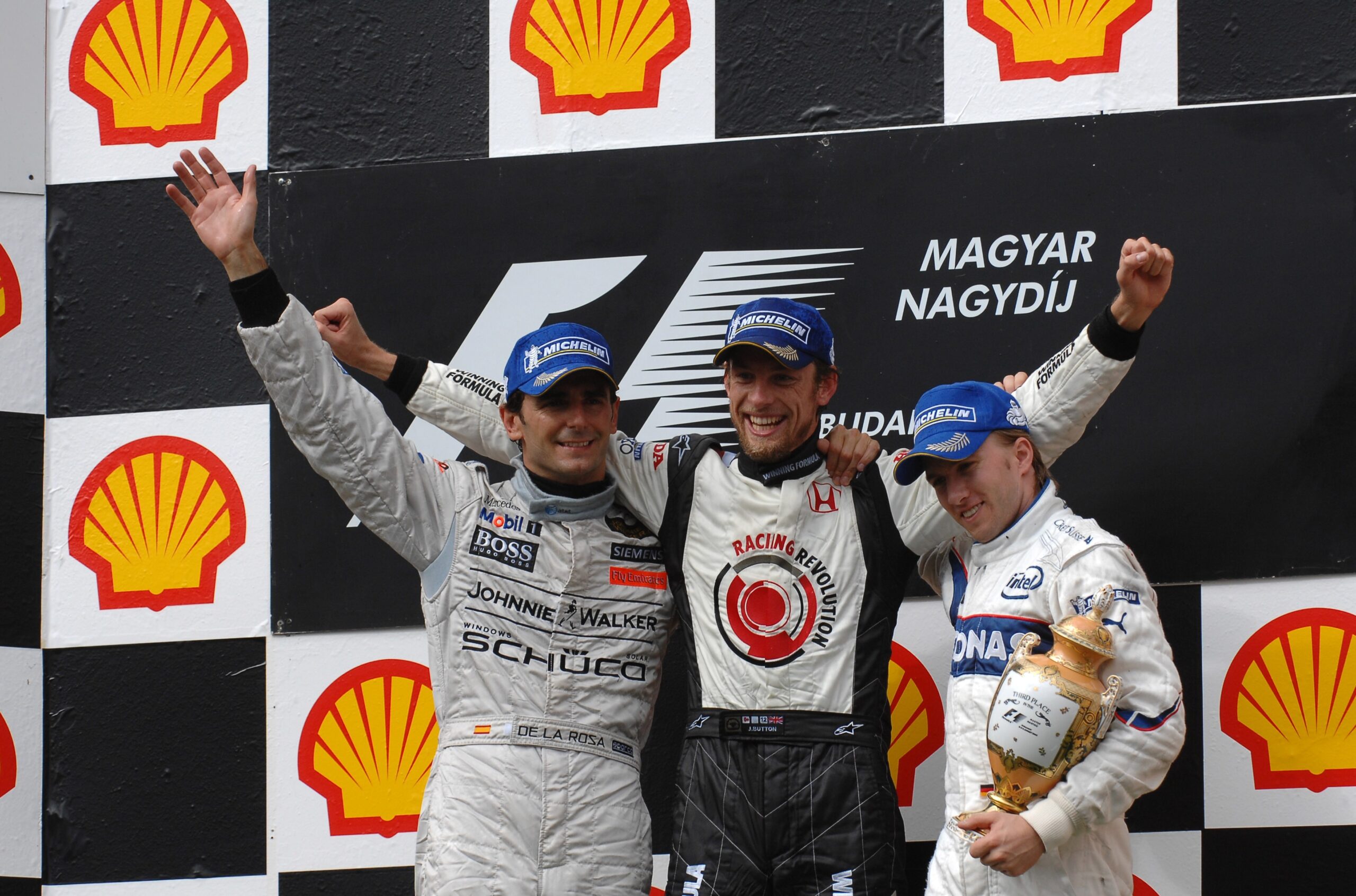 Jenson Button, Honda, Brawn, Grand Prix, GP, Hongrie, Hungaroring, Budapest, victoire, première, 2006, 2009, BrawnGP, Fernando Alonso, Esteban Ocon, Oscar Piastri, première victoire, Alexander Albon, Lance Stroll, Nico Hülkenberg, Kimi Räikkönen, Michael Schumacher, champion du monde, course, Michelin, Bridgestone, pneus, Vitantonio Luzzi, Pedro de la Rosa, Robert Kubica
