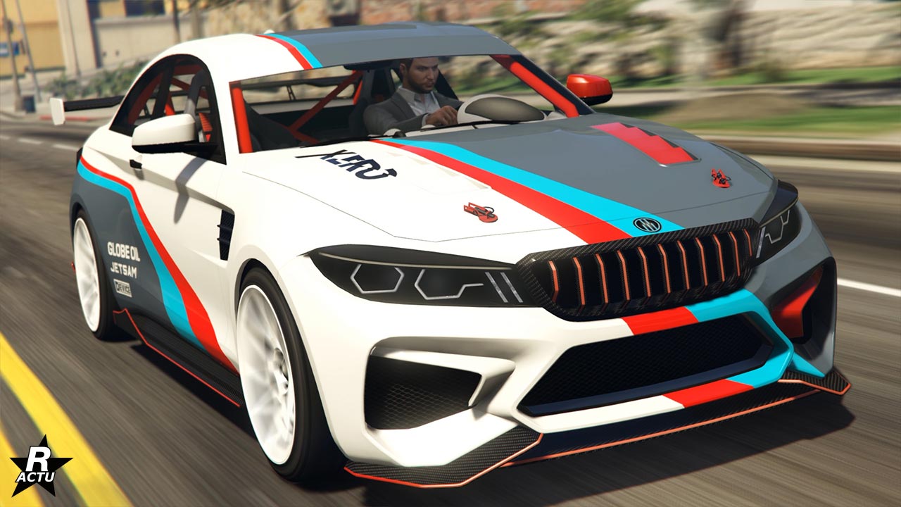 Une voiture de sport blanche Ubermacht Cypher avec des bandes de course bleues, rouges et grises, ainsi que le numéro ‘73’ sur le capot. Le design moderne de la voiture présente des angles vifs, de grandes prises d’air sur le pare-chocs avant, et une marque de sponsors fictifs bien en vue.