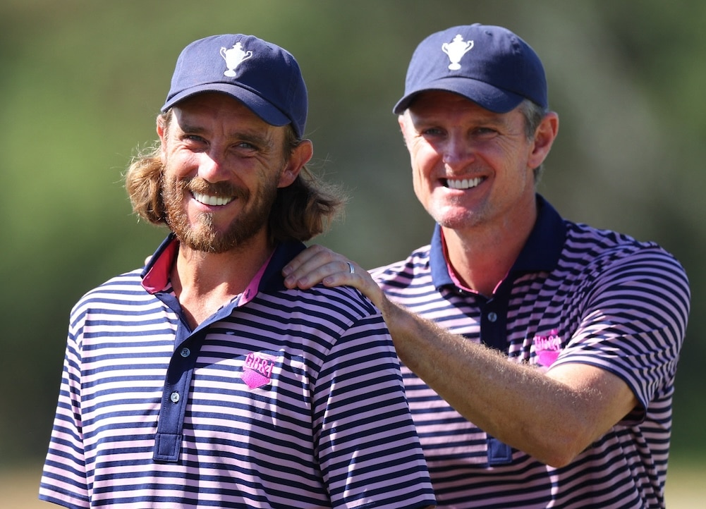 Tommy Fleetwood and Justin Rose Photo by Andrew Redington/Getty Images