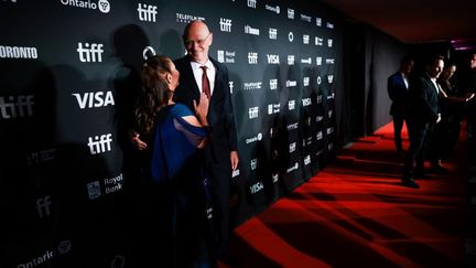 Le général israélien à la retraite Noam Tibon et sa femme Gali Mir-Tibon à l'avant-première de "The Road Between Us: The Ultimate Rescue" au festival du film de Toronto, le 10 septembre 2025. (COLE BURSTON / AFP)