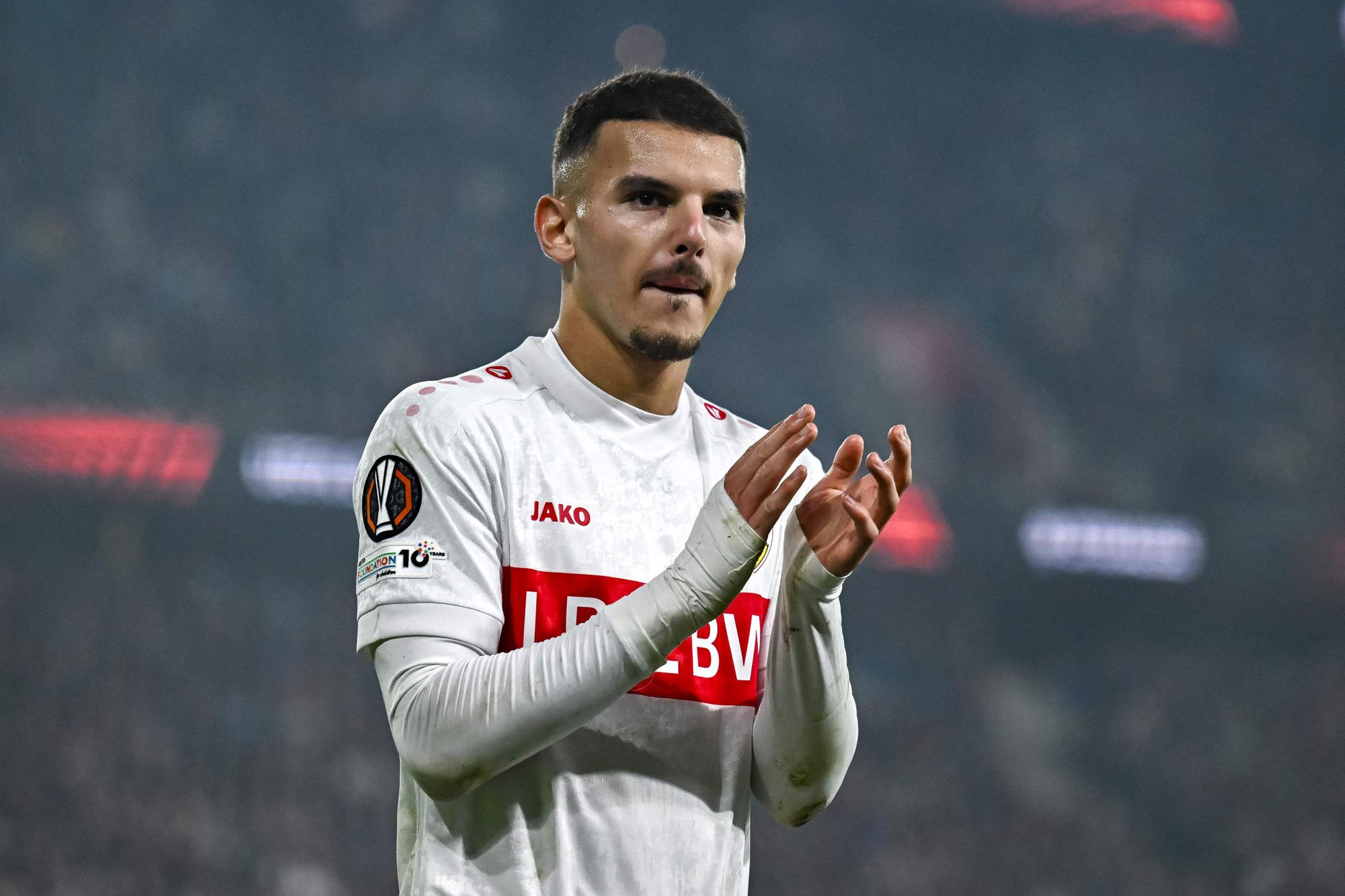 A generic square placeholder image with rounded corners in a figure.