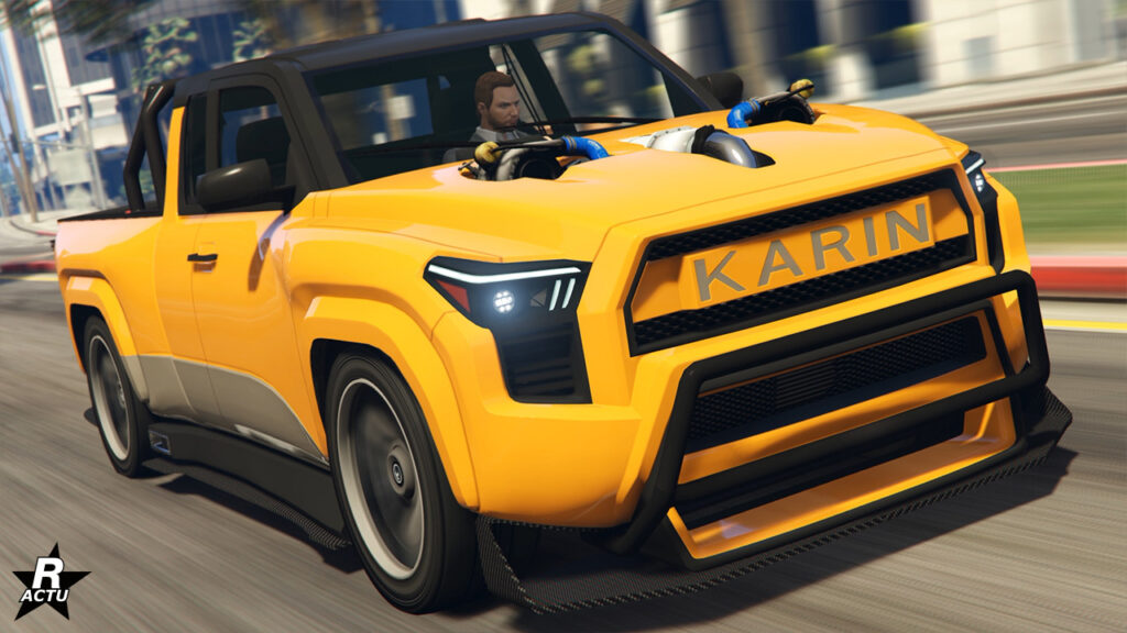 Le SUV vue de devant et disposant d'une peinture jaune vif sur sa carrosserie. Des éléments du moteur dépassent du capot.