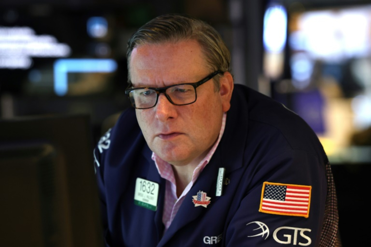 Un opérateur à la Bourse de New York le 13 octobre 2025 ( AFP / TIMOTHY A. CLARY )