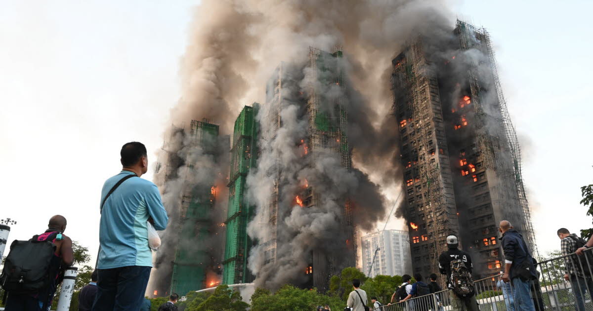 un incendie ravage des immeubles, au moins 36 morts et près de 280 disparus