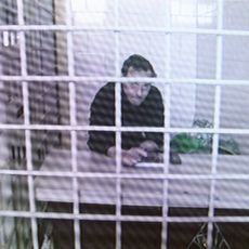 Le Français Laurent Vinatier, condamné à trois ans de prison en Russie, lors d'un appel en visioconférence depuis sa prison le 24 février 2025.