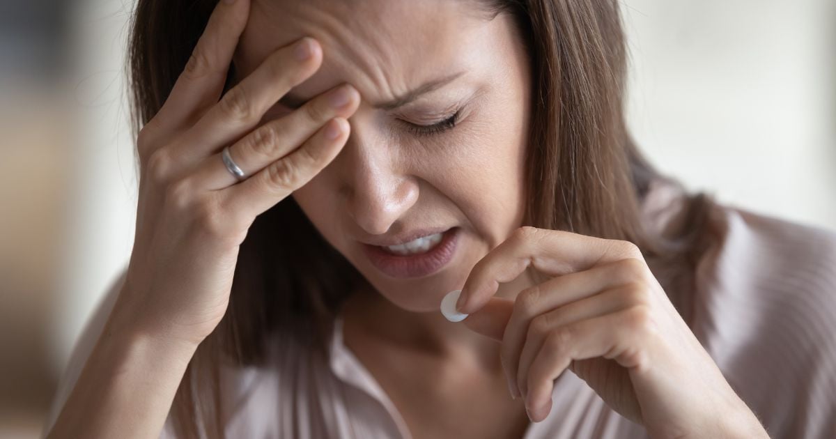 Femme qui mal à la tête 