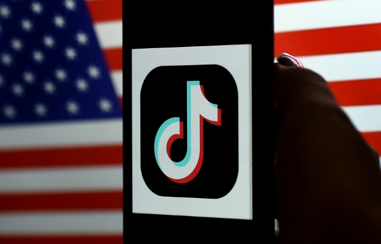 Tiktok has about 200 million users in the United States  ( AFP / Olivier DOULIERY )